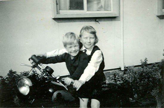 Kevin-Carter-Sue-Corness-on-Mrs-Carters-MotorbikeMrs-Carter-was-the-District-Nurse