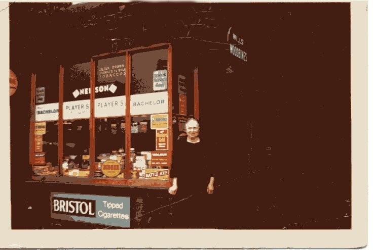 Lilian-Brown-outside-her-shop-in-Halewood-Road